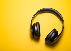 Wireless Pro: black headphones on a yellow background